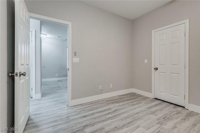 8021 Dancing Springs St, Las Vegas, NV 89143 - empty room featuring light wood finished floors