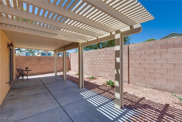 8021 Dancing Springs St, Las Vegas, NV 89143 - fenced backyard with a pergola and a patio