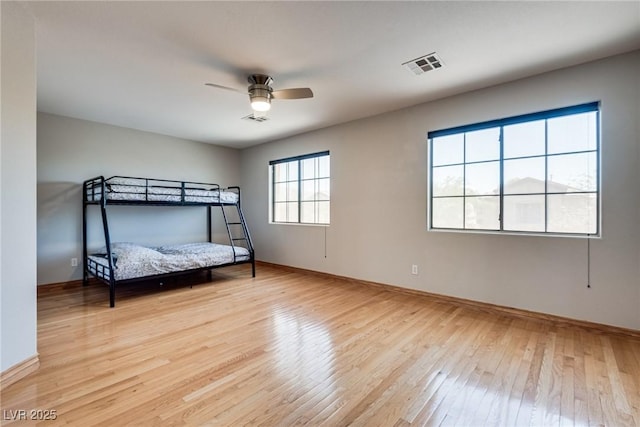 8021 Dancing Springs St, Las Vegas, NV 89143 - bedroom featuring wood-type flooring and a ceiling fan