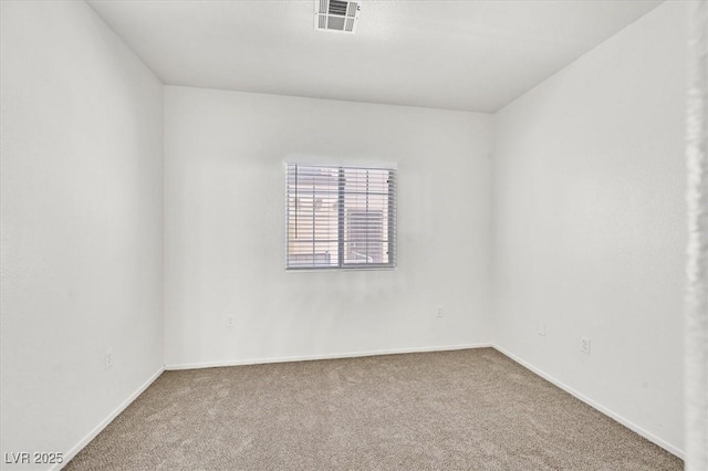 5960 Palmilla St Unit 7, North Las Vegas, NV 89031 - spare room featuring carpet and baseboards