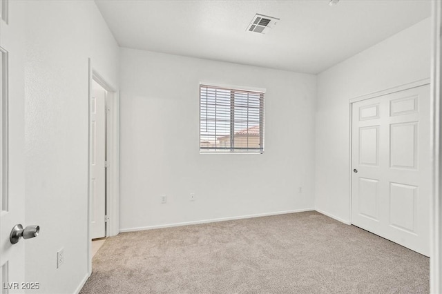 5960 Palmilla St Unit 7, North Las Vegas, NV 89031 - unfurnished bedroom featuring carpet