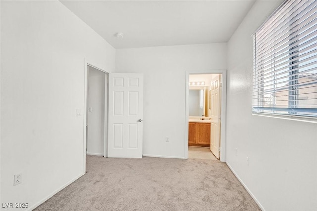5960 Palmilla St Unit 7, North Las Vegas, NV 89031 - unfurnished bedroom with carpet and ensuite bathroom