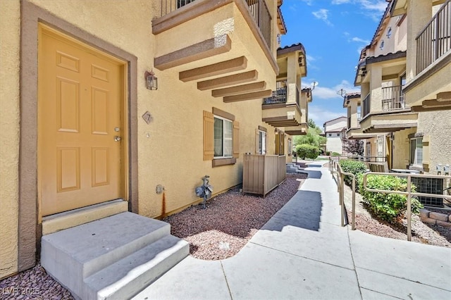 5960 Palmilla St Unit 7, North Las Vegas, NV 89031 - property entrance featuring stucco siding