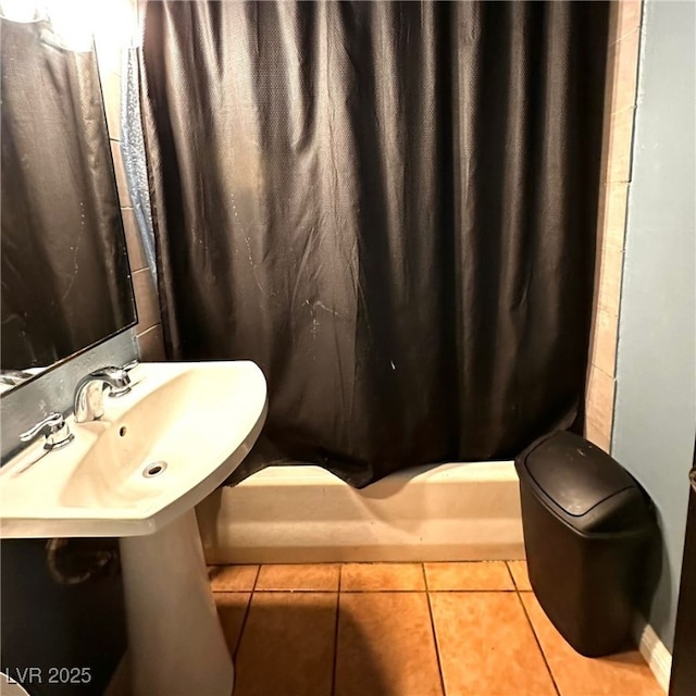 2709 Carroll St, North Las Vegas, NV 89030 - bathroom with tile patterned flooring and a shower with shower curtain