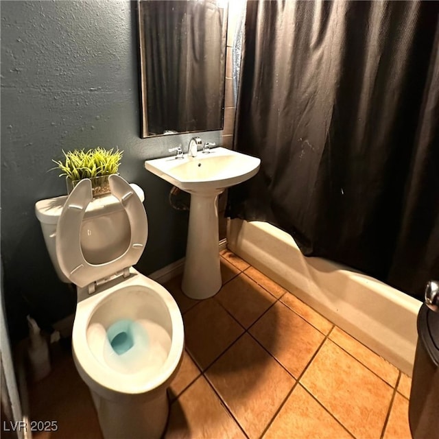 2709 Carroll St, North Las Vegas, NV 89030 - full bathroom featuring shower / bath combination with curtain and tile patterned floors