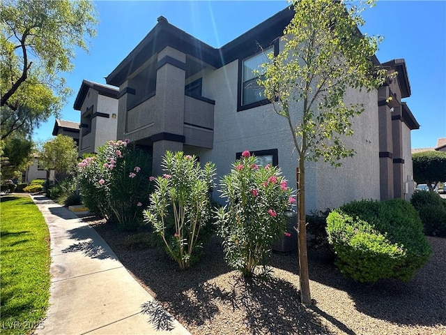 45 Maleena Mesa St Unit 211, Henderson, NV 89074 - view of property exterior with stucco siding