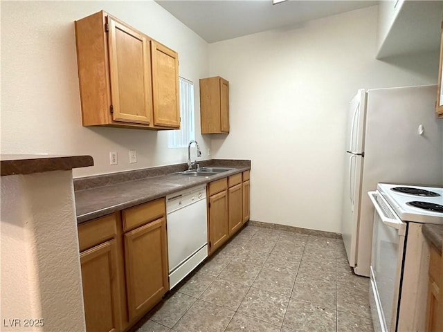 45 Maleena Mesa St Unit 211, Henderson, NV 89074 - kitchen with white appliances, dark countertops, and light tile patterned floors