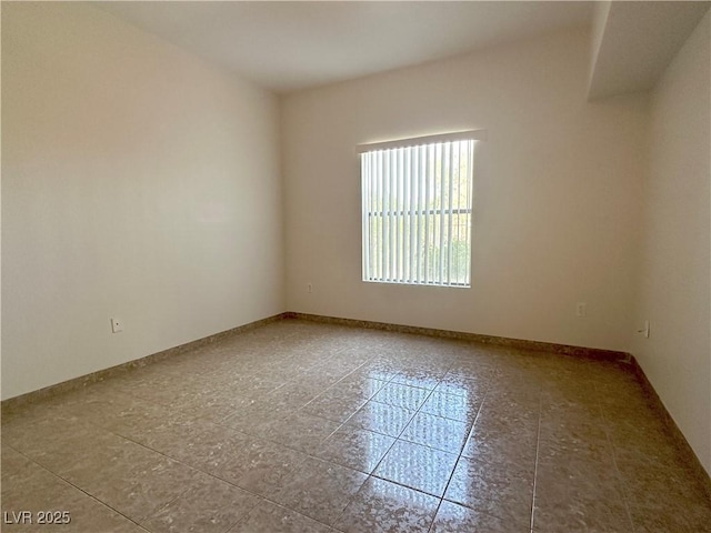 45 Maleena Mesa St Unit 211, Henderson, NV 89074 - tiled spare room with baseboards