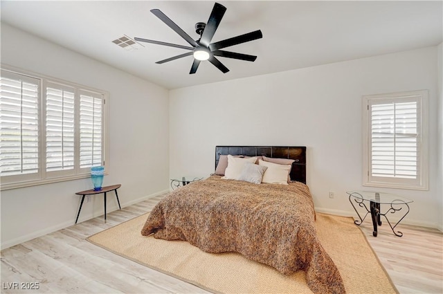 10921 Calcedonian St, Las Vegas, NV 89141 - bedroom featuring wood finished floors and a ceiling fan