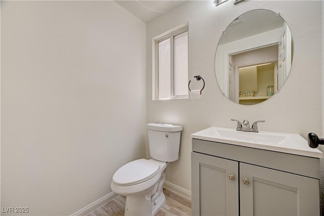 10921 Calcedonian St, Las Vegas, NV 89141 - half bath with vanity and wood finished floors