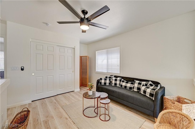 10921 Calcedonian St, Las Vegas, NV 89141 - living area with light wood finished floors and ceiling fan