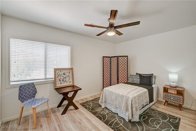 10921 Calcedonian St, Las Vegas, NV 89141 - bedroom with wood finished floors and a ceiling fan