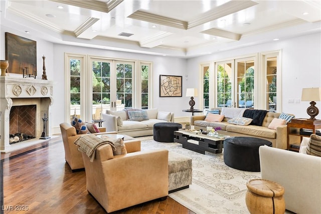 30 Augusta Canyon Way, Las Vegas, NV 89141 - living area with crown molding, hardwood / wood-style floors, a high end fireplace, coffered ceiling, and french doors