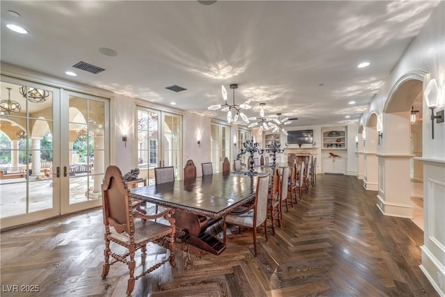 30 Augusta Canyon Way, Las Vegas, NV 89141 - dining room featuring french doors, a chandelier, recessed lighting, and arched walkways