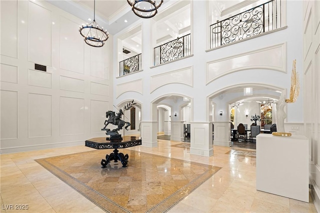 30 Augusta Canyon Way, Las Vegas, NV 89141 - lobby with a decorative wall, a towering ceiling, and ornamental molding