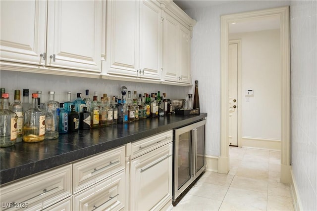 30 Augusta Canyon Way, Las Vegas, NV 89141 - indoor dry bar with wine cooler and light tile patterned floors