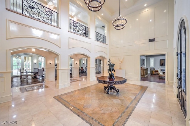 30 Augusta Canyon Way, Las Vegas, NV 89141 - building lobby featuring a decorative wall, a towering ceiling, and recessed lighting