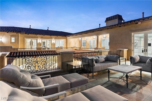 30 Augusta Canyon Way, Las Vegas, NV 89141 - wooden terrace featuring french doors, an outdoor hangout area, and a patio