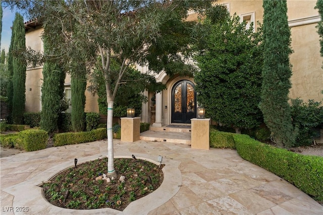 30 Augusta Canyon Way, Las Vegas, NV 89141 - property entrance with french doors and stucco siding