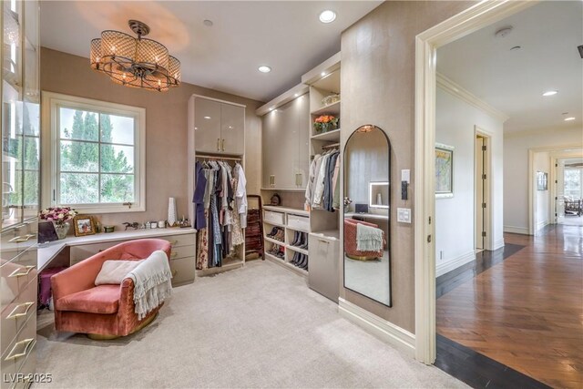 30 Augusta Canyon Way, Las Vegas, NV 89141 - bathroom with a chandelier, recessed lighting, a spacious closet, crown molding, and wood finished floors