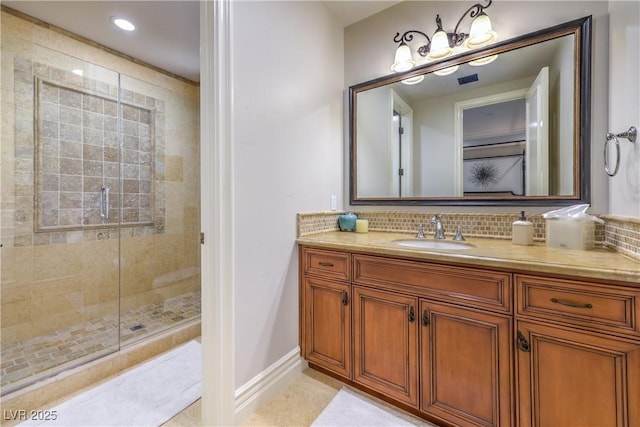 30 Augusta Canyon Way, Las Vegas, NV 89141 - bathroom with a stall shower, vanity, and tasteful backsplash