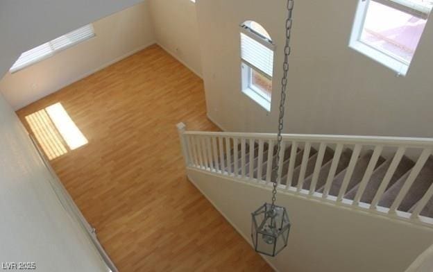 3711 Lodina Ct, Las Vegas, NV 89141 - staircase with wood finished floors and healthy amount of natural light