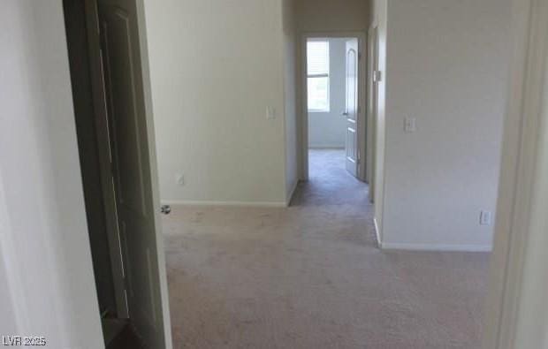 3711 Lodina Ct, Las Vegas, NV 89141 - hallway with carpet and baseboards