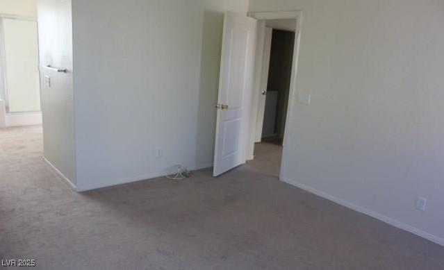 3711 Lodina Ct, Las Vegas, NV 89141 - unfurnished room with carpet floors and baseboards