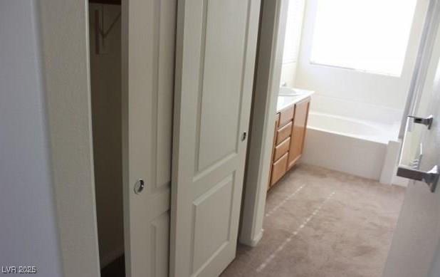 3711 Lodina Ct, Las Vegas, NV 89141 - full bath featuring a garden tub and vanity