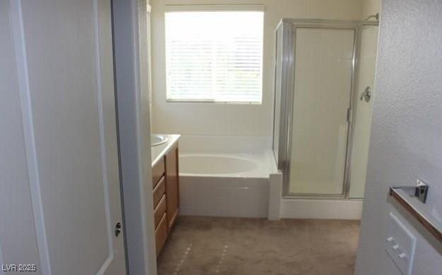3711 Lodina Ct, Las Vegas, NV 89141 - full bathroom with vanity, a bath, and a shower stall