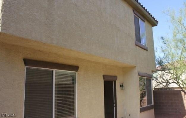 3711 Lodina Ct, Las Vegas, NV 89141 - view of home's exterior with stucco siding