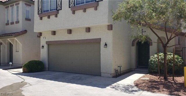 3711 Lodina Ct, Las Vegas, NV 89141 - entrance to property featuring stucco siding, a garage, and driveway