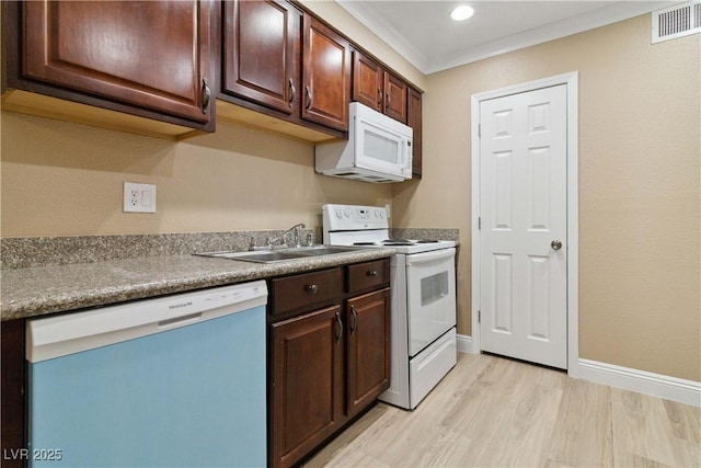 2451 N Rainbow Blvd Unit 1091, Las Vegas, NV 89108 - kitchen featuring white appliances, light wood finished floors, dark brown cabinetry, crown molding, and recessed lighting