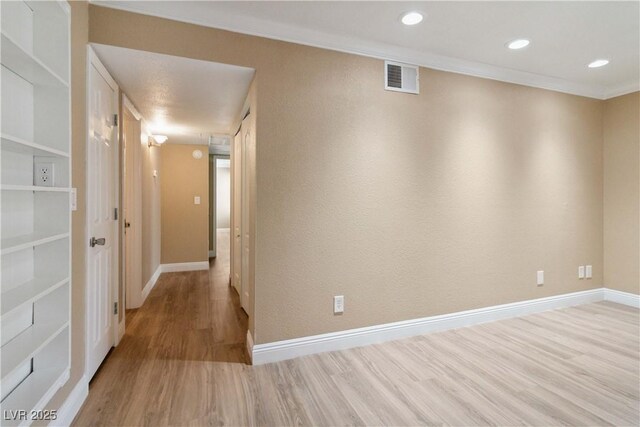 2451 N Rainbow Blvd Unit 1091, Las Vegas, NV 89108 - hallway with wood finished floors, recessed lighting, and crown molding