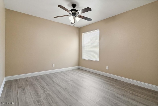 2451 N Rainbow Blvd Unit 1091, Las Vegas, NV 89108 - empty room with wood finished floors and a ceiling fan