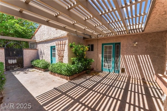 2486 Sabado St, Las Vegas, NV 89121 - view of patio with a pergola and a gate