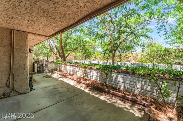 2486 Sabado St, Las Vegas, NV 89121 - fenced backyard with a patio area
