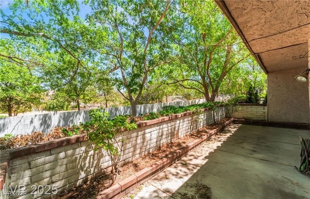 2486 Sabado St, Las Vegas, NV 89121 - fenced backyard with a patio