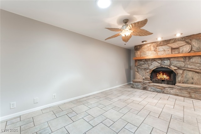 2486 Sabado St, Las Vegas, NV 89121 - unfurnished living room featuring a fireplace, ceiling fan, and tile patterned flooring