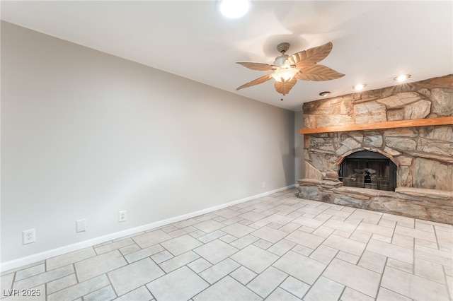 2486 Sabado St, Las Vegas, NV 89121 - unfurnished living room with a fireplace, ceiling fan, recessed lighting, and tile patterned floors