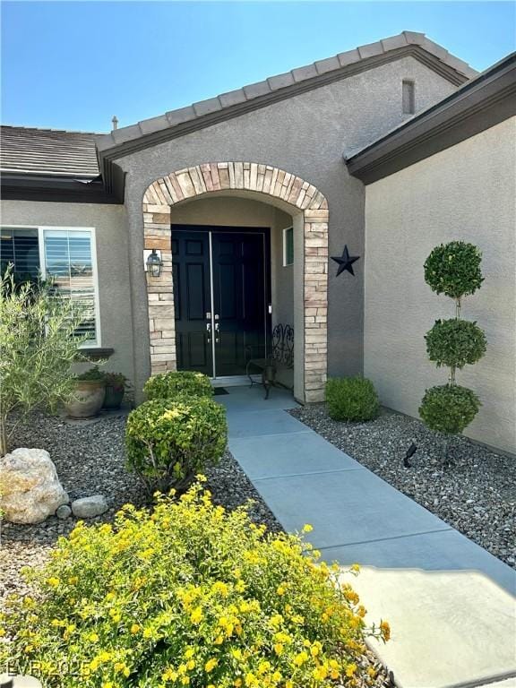 2257 Turner Falls St, Henderson, NV 89044 - view of exterior entry with stone siding and stucco siding