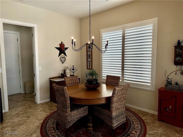 2257 Turner Falls St, Henderson, NV 89044 - dining area with a chandelier and baseboards
