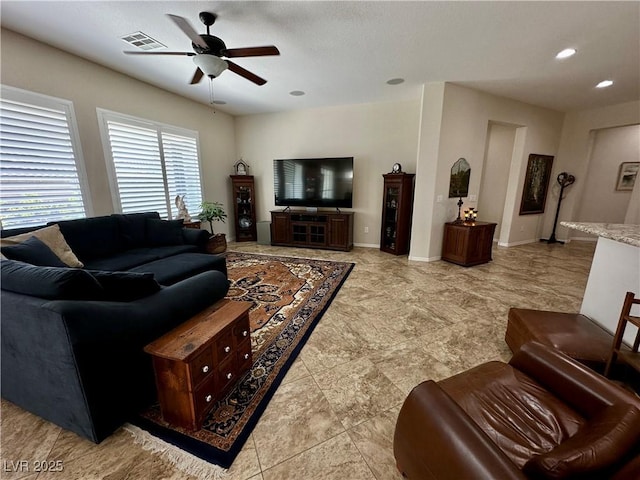 2257 Turner Falls St, Henderson, NV 89044 - living area featuring a ceiling fan and baseboards