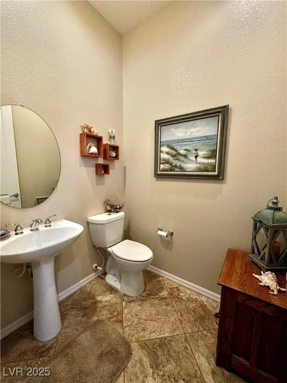 2257 Turner Falls St, Henderson, NV 89044 - half bathroom featuring toilet and a sink