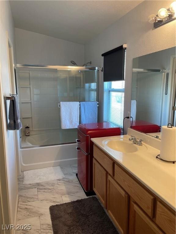 3521 Hazelnut Pine Pl Unit 1, North Las Vegas, NV 89084 - full bath with vanity, marble finish flooring, and bath / shower combo with glass door
