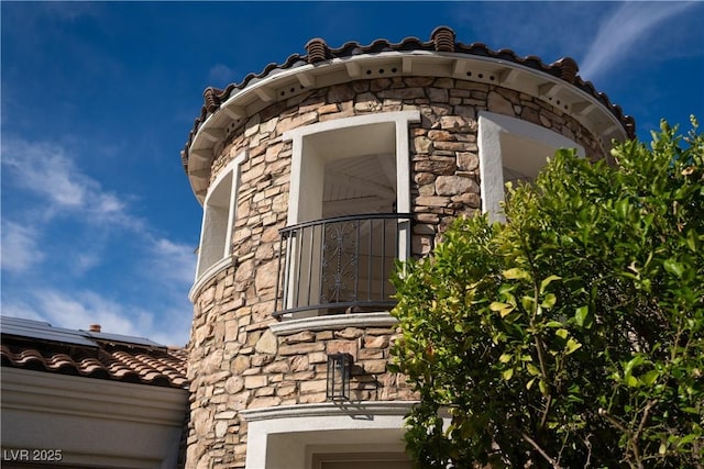 11830 Kingsbarns Ct, Las Vegas, NV 89141 - view of property exterior with stone siding and solar panels