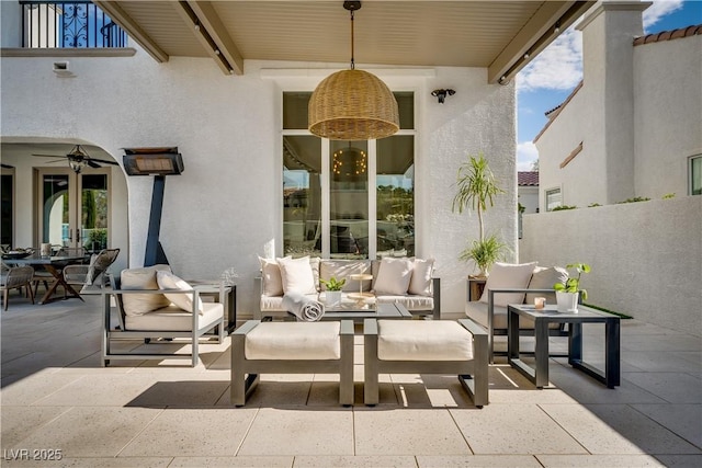 11830 Kingsbarns Ct, Las Vegas, NV 89141 - view of patio with an outdoor living space and a ceiling fan