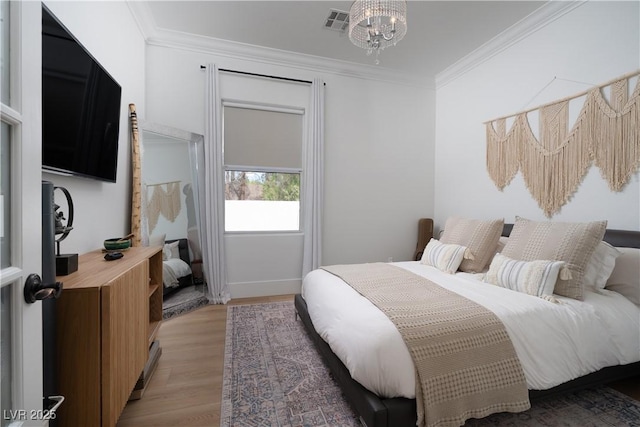 11830 Kingsbarns Ct, Las Vegas, NV 89141 - bedroom featuring crown molding and light wood finished floors