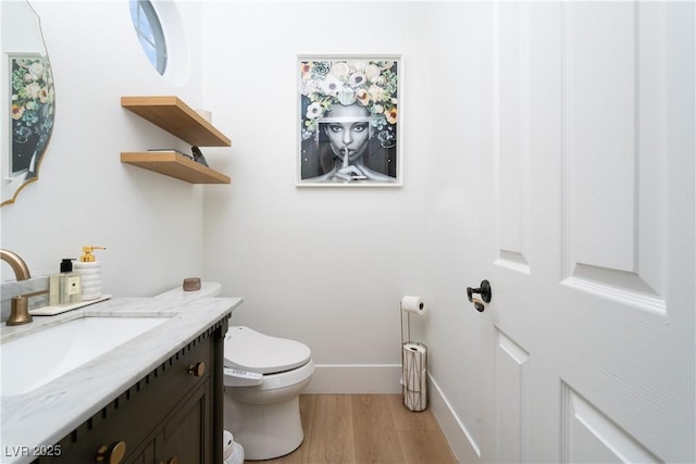 11830 Kingsbarns Ct, Las Vegas, NV 89141 - half bathroom with wood finished floors and vanity