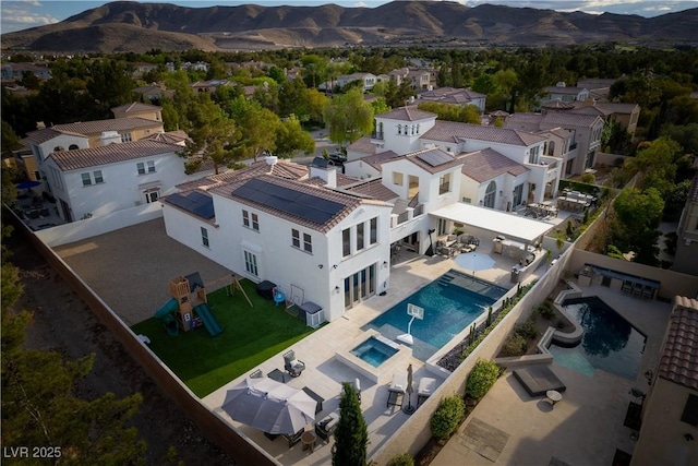 11830 Kingsbarns Ct, Las Vegas, NV 89141 - aerial view of residential area with a mountain backdrop